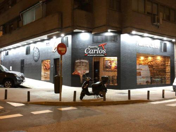 Pizzerías Carlos abre una nueva franquicia junto al Parque del Retiro
