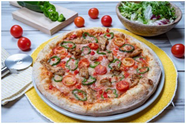 La franquicia Pizzerías Carlos lanza sus nuevas pizzas veganas junto a Heura Foods.