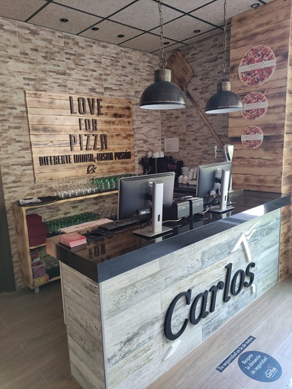 Pizzerías Carlos inaugura tres nuevos restaurantes franquicia.