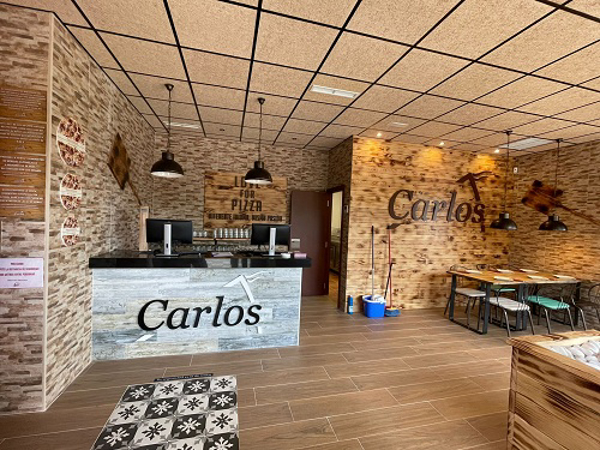 Pizzerías Carlos llega a Galicia con la apertura de un restaurante franquicia en Vigo